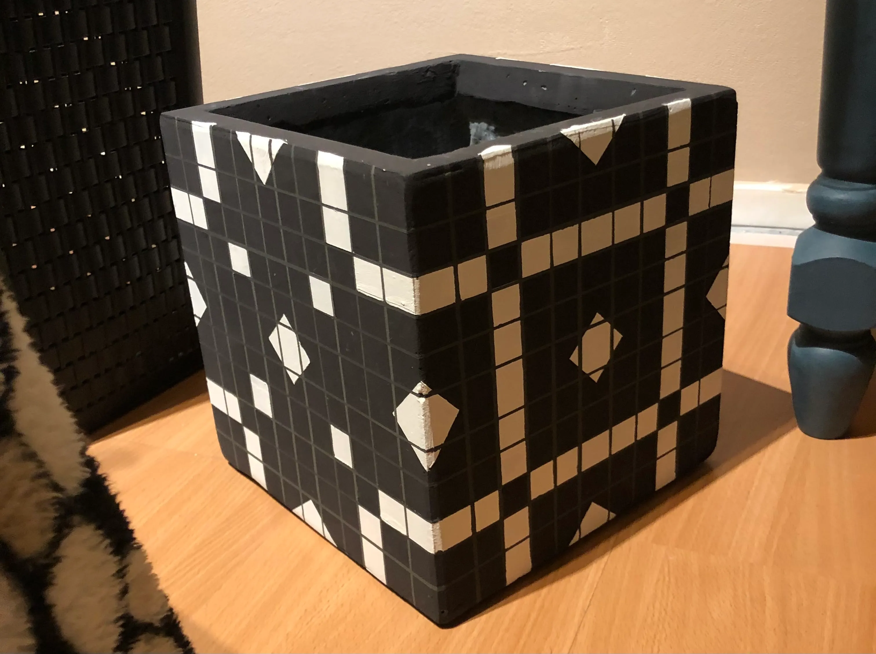 A plant pot that I've painted in a geometric way.
